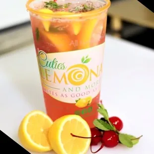 CHERRY MINT LEMONADE Maraschino Cherries and mojito mints mixed with fresh squeezed lemon pulp with granulated sugars