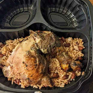 Dark meat jerk chicken with rice and peas