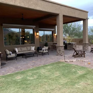 Pavers, Low-Voltage Lighting, Irrigation Line, Rock Facade on Columns