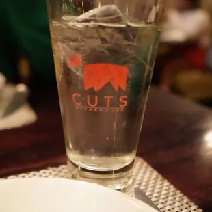 a glass of water on a table