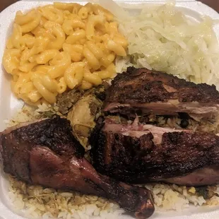 Jerk Chicken with white rice cabbage and Mac