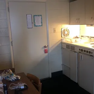 Kitchen bathroom is to the left