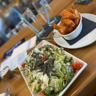 Caesar salad and buffalo wings