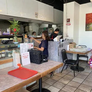 That&apos;s the man who pointed a seat. And that&apos;s the waiter in blue who literally just ignored us. No greeting whatsoever.