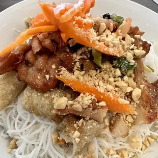 Vermicelli noodles with egg rolled and chargrilled chicken! $8.95. Big portion! Very yummy!