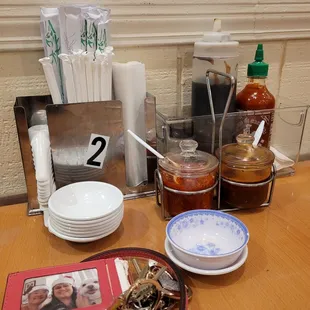  table full of condiments and condiments