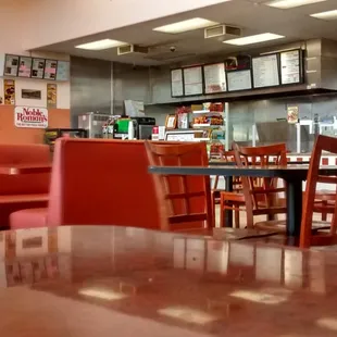 a table and chairs in a restaurant