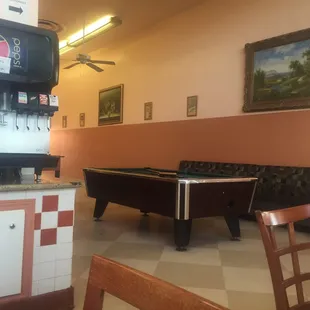 Pool table and an arcade area