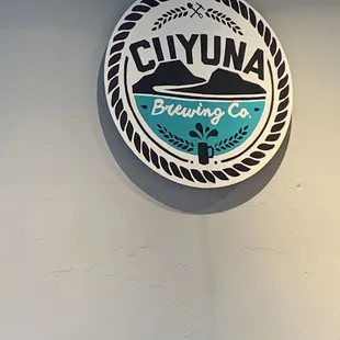 a circular sign on the wall
