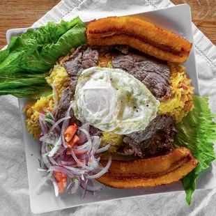 Bicteck a la Pobre " This Plate is call Steak like the poors , wich is a dark joke , becouse you have to be poor maybe to eat that much, lol