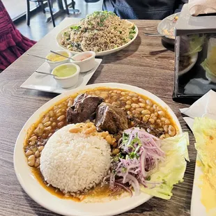 Seco de Cabrito Y arroz chaufa