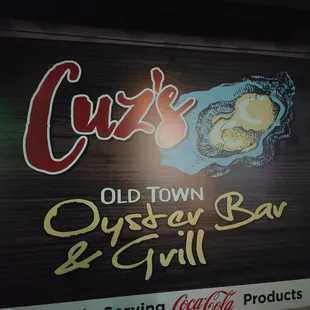 a sign for oyster bar and grill