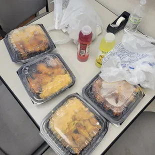 three trays of food on a table