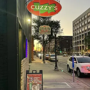 a sign for cuzzy&apos;s