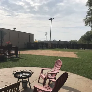 a fire pit and lawn