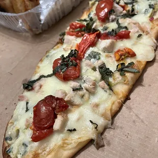 a long piece of pizza