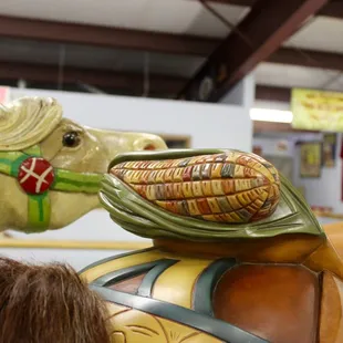 The ear of corn is a special signal to denote where the horse was made