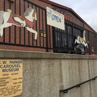 Front entrance with posted hours