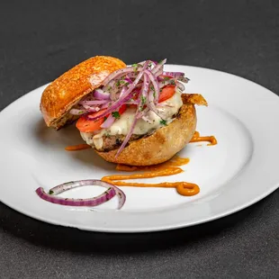 a white plate with a sandwich on it