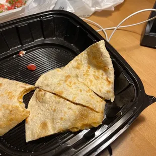 Half of chicken quesadilla sorry for presentation but it was awesome and I was hungry