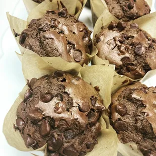 a plate of chocolate muffins