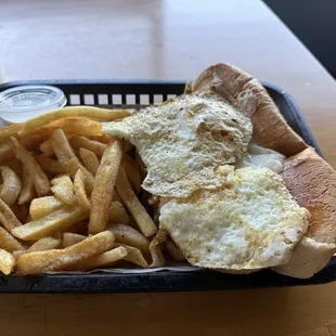 Chicken Deluxe with eggs on top.