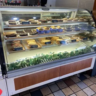 a display case full of baked goods