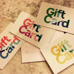 a pile of gift cards