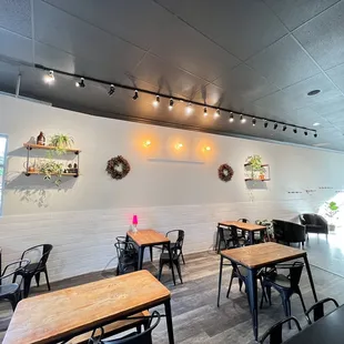 tables and chairs in a coffee shop