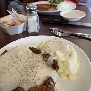 Chicken fried steak with 2 sides (salad not shown)