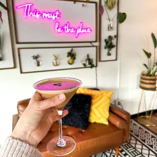 a person holding a wine glass