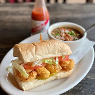 a plate with a sandwich and a bowl of soup