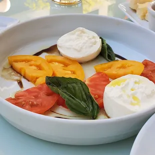 Burrata with basil tomatoes and balsamic vinegar