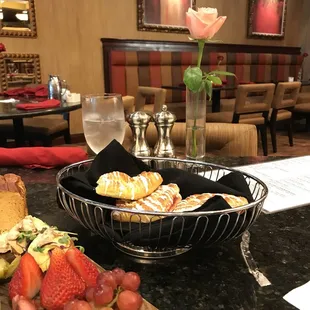 a plate of food and a glass of wine