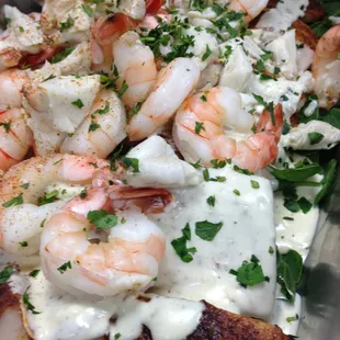 Mahi Mahi with lobster cream, lump crabmeat, and shrimp.