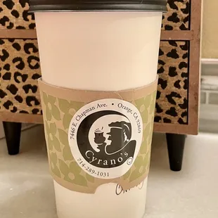 a cup of coffee and a spoon