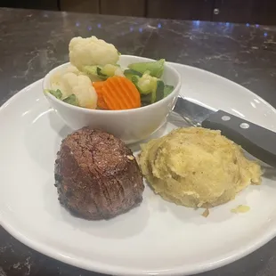 Filet, potatoes, and veggies.