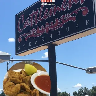 Lamb Fries with cocktail sauce and lemon