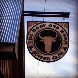 a sign for the hoof and horn super club