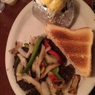 Chopped Steak with grilled onions &amp; green pepper; your choice of potato &amp; we also got a side salad.
