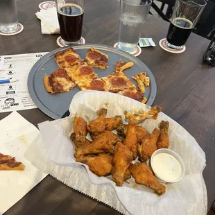 Buffalo wings and pepperoni pizza