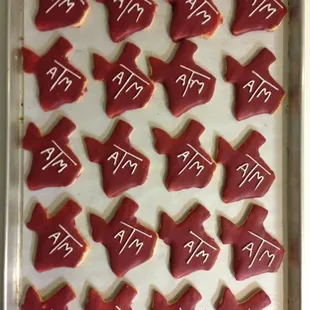 a tray of decorated cookies