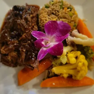 Jerk Short Ribs with fried rice and mixed vegetables