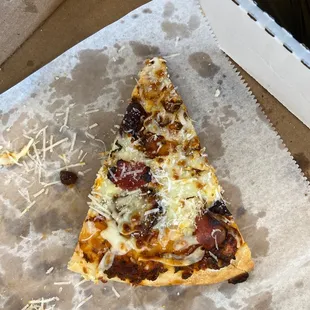 The pizza. This has a bit of Parmesan on top.