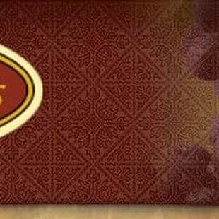 a bunch of grapes hanging from a vine