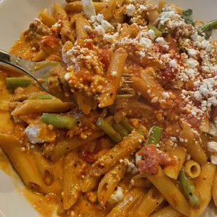 My new obsession... chicken chorizo pasta add extra goat cheese.  Get this!!