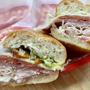 (*‿*)Husband recommends "Wanna be Italian". Turkey, salami, pepperoni, provolone w/lettuce, tomato, onions, peppers &amp; dressing.