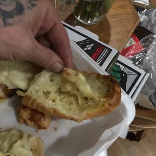 Cheese bread with separated cheese do to sitting and they are not competent in delivery.