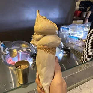 Hazelnut and Italian Coffee gelato in a cone