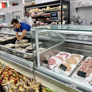 a woman working in a deli